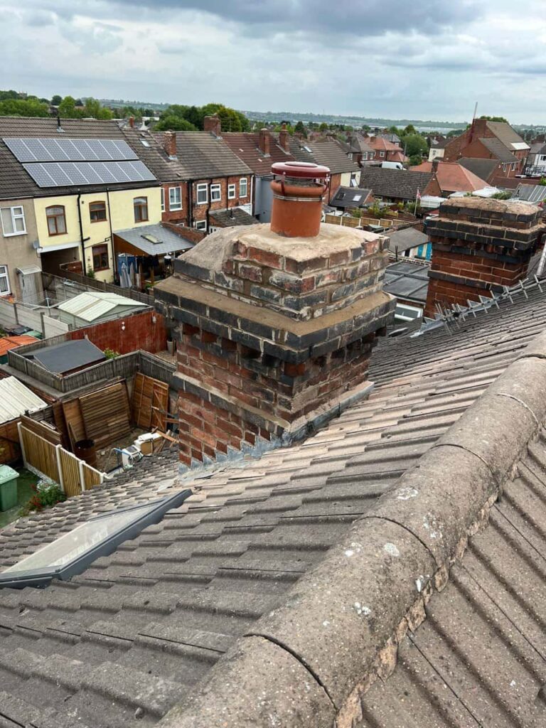 This is a photo taken from a roof which is being repaired by Belper Roofing Repairs, it shows a street of houses, and their roofs